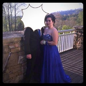 Blush prom gown and silver sparkly pumps